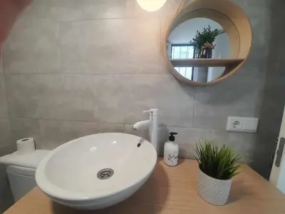 Un baño de ISG Apartments Feria 106