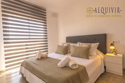 Cama o camas de una habitación en Ático con Terraza San Julian Cordoba