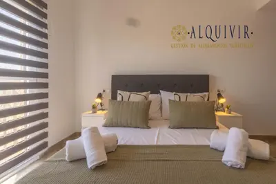 Cama o camas de una habitación en Ático con Terraza San Julian Cordoba