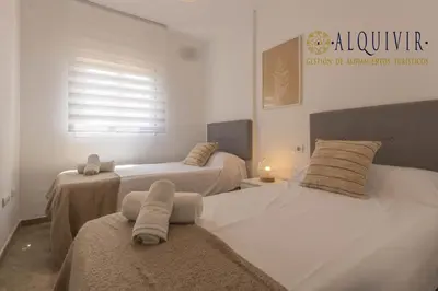 Cama o camas de una habitación en Ático con Terraza San Julian Cordoba