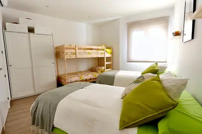 Cama o camas de una habitación en El Arrebol