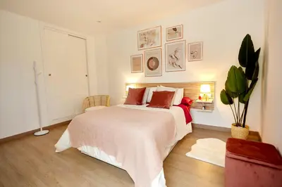 Cama o camas de una habitación en El Arrebol