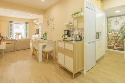 Una cocina o zona de cocina en Geysotur JUANI Centro Parking y Wifi gratis