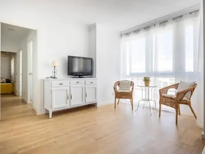 Una televisión o centro de entretenimiento en Apartamento Isbilya
