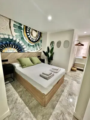Cama o camas de una habitación en Apartamento Lucano