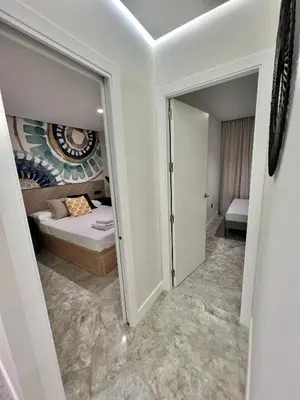 Cama o camas de una habitación en Apartamento Lucano