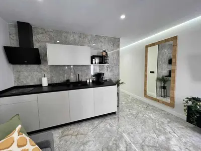 Una cocina o zona de cocina en Apartamento Lucano