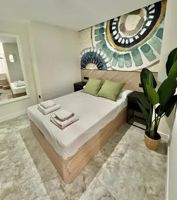 Cama o camas de una habitación en Apartamento Lucano