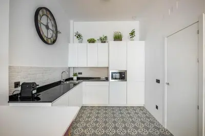 Una cocina o zona de cocina en BeHouse Macarena