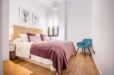 Cama o camas de una habitación en BeHouse Macarena