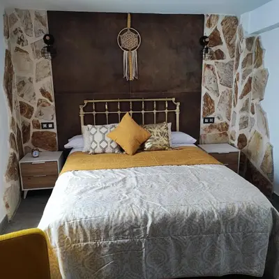 Cama o camas de una habitación en La Medina Alta