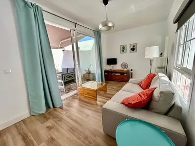 Zona de estar de Ático con vistas espectaculares a la Catedral - CozyHomeSevilla7