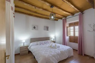 Cama o camas de una habitación en Casa Rural Maimones.
