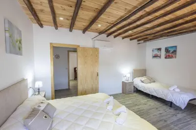 Cama o camas de una habitación en Casa Rural Maimones.