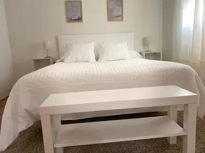 Cama o camas de una habitación en APARTAMENTO PLAZA ESPAÑA