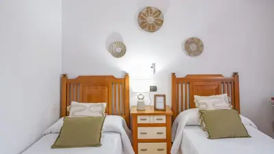 Cama o camas de una habitación en Villa Paqui Villanueva de la Concepción by Ruralidays