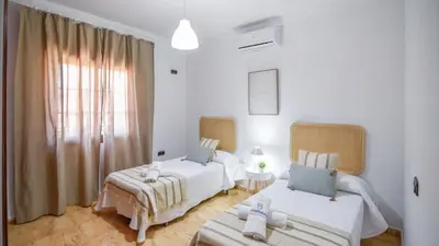 Cama o camas de una habitación en Villa Paqui Villanueva de la Concepción by Ruralidays