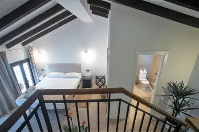 Cama o camas de una habitación en Vitium Córdoba