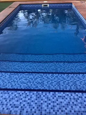Piscina en o cerca de Casa de madera el oasis el palomar