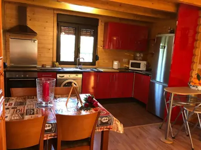 Una cocina o zona de cocina en Casa de madera el oasis el palomar