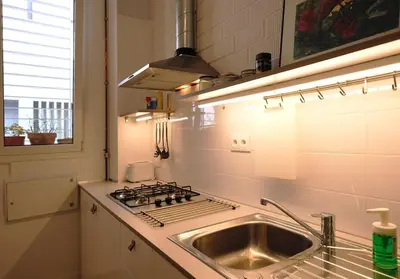 Una cocina o zona de cocina en Casa entera e independiente con parking en pleno centro de Sevilla