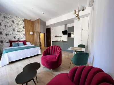 Cama o camas de una habitación en Cosy apartment in Córdoba, city view, 32 sqm, balcony
