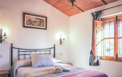 Cama o camas de una habitación en Cozy Home In Villanueva Del Rosario