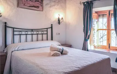 Cama o camas de una habitación en Cozy Home In Villanueva Del Rosario