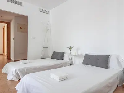 Cama o camas de una habitación en Algaba Pisc planta Baja D