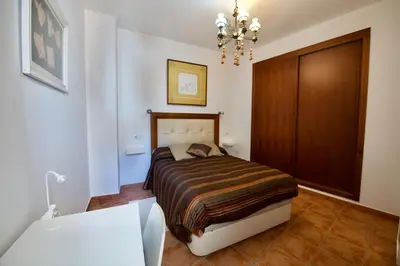 Cama o camas de una habitación en Aires de cazalla