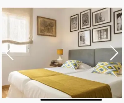 Cama o camas de una habitación en Exclusivo Duplex con terraza en Sevilla