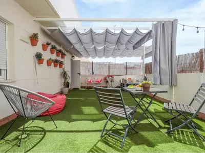 Zona de estar de Exclusivo Duplex con terraza en Sevilla