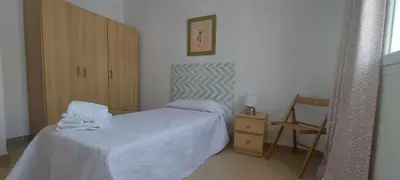 Cama o camas de una habitación en Casa Yerbabuena