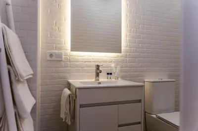 Un baño de Alojamiento Rural con jacuzzi privado