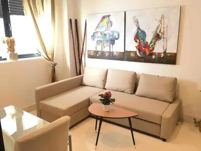 Zona de estar de Acogedor Apartamento José Laguillo.