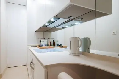 Una cocina o zona de cocina en Acogedor Apartamento José Laguillo.