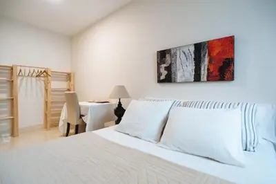 Cama o camas de una habitación en Acogedor Apartamento José Laguillo.