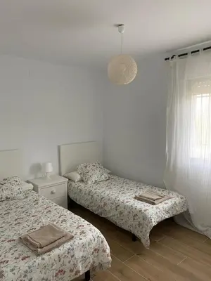 Cama o camas de una habitación en Villa Marta