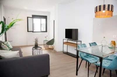 Una televisión o centro de entretenimiento en GoToSeville Faustino Flats
