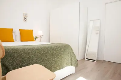 Cama o camas de una habitación en GoToSeville Faustino Flats