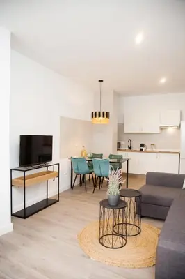 Una televisión o centro de entretenimiento en GoToSeville Faustino Flats