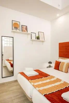 Cama o camas de una habitación en ISG Apartments Encantador estudio en Alameda de Hércules