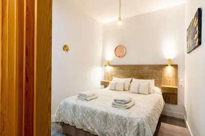 Cama o camas de una habitación en ESTUDIO EN PLENO CENTRO de SEVILLA by MSHOLIDAYS