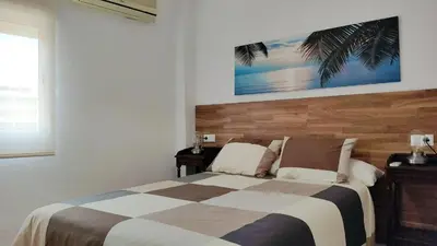 Cama o camas de una habitación en Selecta 3 dormitorios junto a Sanchez Pizjuan