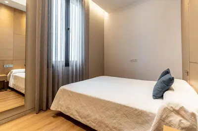 Cama o camas de una habitación en Tendillas Plaza