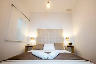 Cama o camas de una habitación en Castellar Centro Apartment