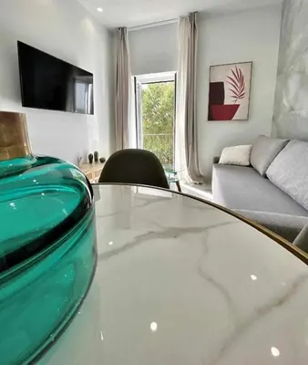 Una televisión o centro de entretenimiento en Apartamento Isasa