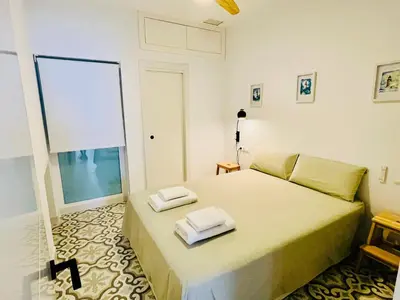 Cama o camas de una habitación en Modern apartment in the city centre, La Alameda