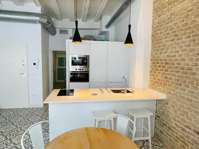 Una cocina o zona de cocina en Modern apartment in the city centre, La Alameda