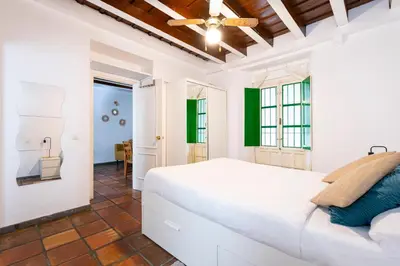 Cama o camas de una habitación en Alohamundi Alcázares